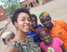 Elena Ruyter '14 with girls in Burkina Faso.